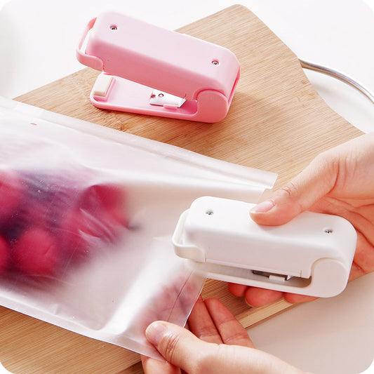 Portable Vacuum Sealer in use